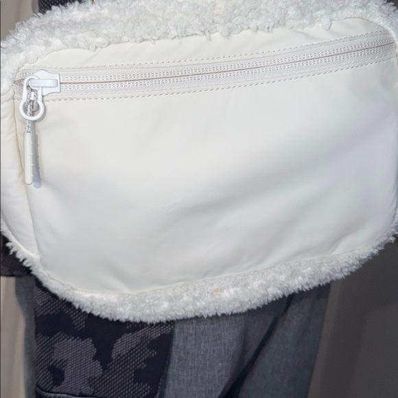 Lululemon EUC cream Crossbody bag with lots of storage. Clean in and out. - Picture 7 of 8